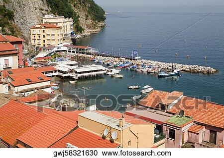 Stock Image - High angle view of buildings at the seaside, Marina Grande, Capri, Sorrento, Sorrentine Peninsula, Naples Province, Campania, Italy. Fotosearch