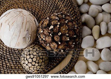 Stock Photo - High angle view of cold stones and spa balls. Fotosearch