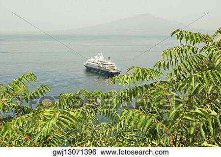 High angle view of cruise ship in the sea, Bay of Naples, Sorrento, Sorrentine Peninsula, Naples Province, Campania, Italy View Large Photo Image Stock Photograph - High angle view of cruise ship in the sea, Bay of Naples, Sorrento, Sorrentine Peninsula, Naples Province, Campania, Italy. Fotosearch