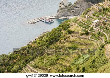 High angle view of ferry in the sea, Ligurian Sea, Italian Riviera, Cinque Terre, La Spezia, Liguria, Italy View Large Photo Image Stock Photo - High angle view of ferry in the sea, Ligurian Sea, Italian Riviera, Cinque Terre, La Spezia, Liguria, Italy. Fotosearch