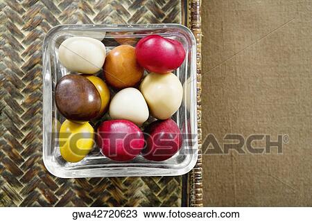 High angle view of pebbles in a bowl View Large Photo Image Stock Image - High angle view of pebbles in a bowl. Fotosearch