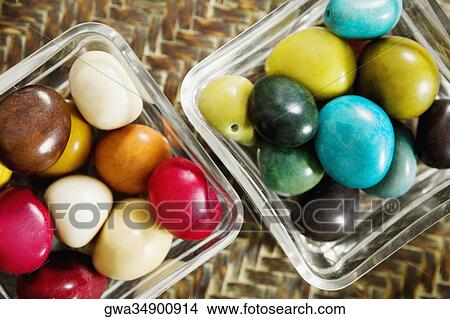 High angle view of pebbles in two bowls View Large Photo Image Picture - High angle view of pebbles in two bowls. Fotosearch