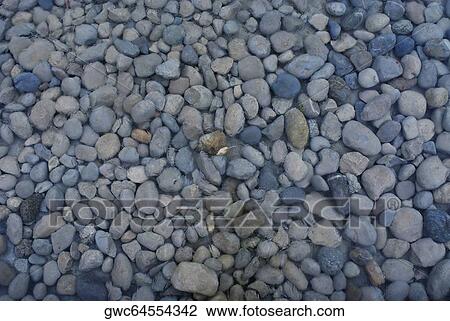 Stock Image - High angle view of pebbles. Fotosearch