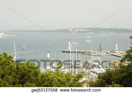 High angle view of ships at a harbor, Vieux Port, Cote d'Azur, Cannes, Provence-Alpes-Cote D'Azur, France View Large Photo Image Stock Photo - High angle view of ships at a harbor, Vieux Port, Cote d'Azur, Cannes, Provence-Alpes-Cote D'Azur, France. Fotosearch