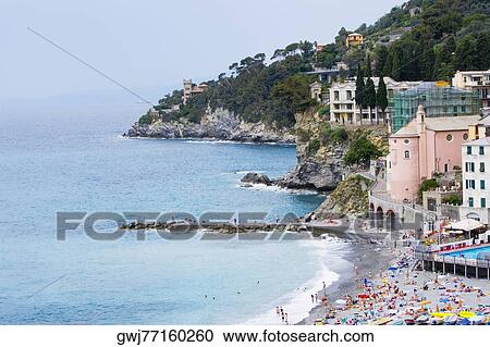 High angle view of tourists on the beach, Sori, Genoa Province, Liguria, Italy View Large Photo Image Stock Image - High angle view of tourists on the beach, Sori, Genoa Province, Liguria, Italy. Fotosearch