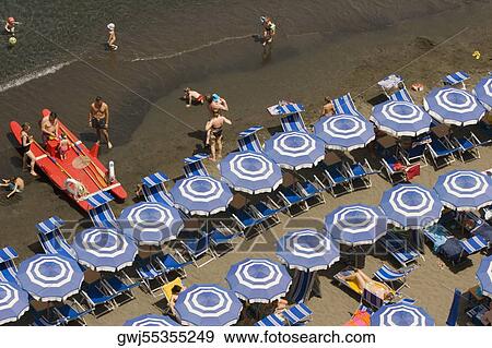 High angle view of tourists on the beach, Marina Grande, Capri, Sorrento, Naples Province, Campania, Italy View Large Photo Image Stock Photo - High angle view of tourists on the beach, Marina Grande, Capri, Sorrento, Naples Province, Campania, Italy. Fotosearch