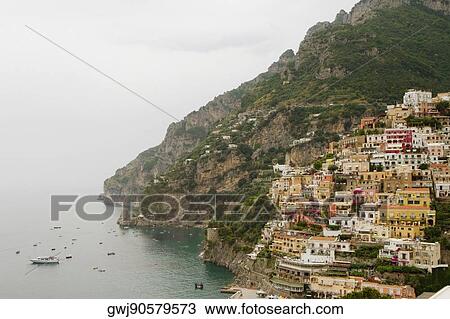 High angle view of town at the seaside, Spiaggia Grande, Positano, Amalfi Coast, Salerno, Campania, Italy View Large Photo Image Stock Image - High angle view of town at the seaside, Spiaggia Grande, Positano, Amalfi Coast, Salerno, Campania, Italy. Fotosearch