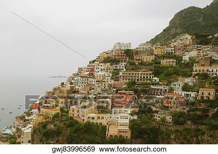 High angle view of town at the seaside, Positano, Amalfi Coast, Salerno, Campania, Italy View Large Photo Image Stock Photo - High angle view of town at the seaside, Positano, Amalfi Coast, Salerno, Campania, Italy. Fotosearch