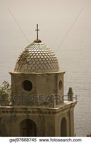 High section view of a church, Church of Santa Margherita d'Antiochia, Italian Riviera, Cinque Terre National Park, Vernazza, La Spezia, Liguria, Italy View Large Photo Image Stock Photography - High section view of a church, Church of Santa Margherita d'Antiochia, Italian Riviera, Cinque Terre National Park, Vernazza, La Spezia, Liguria, Italy. Fotosearch