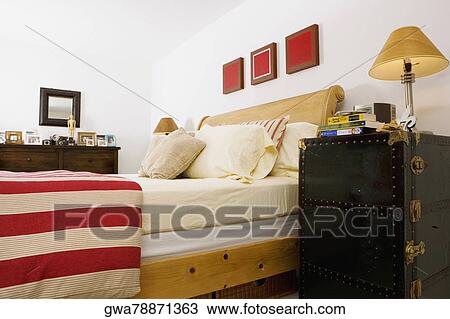Stock Image - Interiors of a bedroom. Fotosearch
