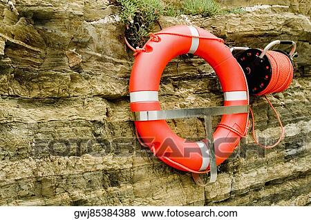Life belt hanging on cliff, Cinque Terre National Park, RioMaggiore, Cinque Terre, La Spezia, Liguria, Italy View Large Photo Image Stock Photo - Life belt hanging on cliff, Cinque Terre National Park, RioMaggiore, Cinque Terre, La Spezia, Liguria, Italy. Fotosearch