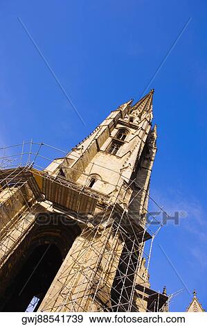 Stock Photo - Low angle view of a basilica under restoration, Fleche St. Michel, St. Michel Basilica, Quartier St. Michel, Vieux Bordeaux, Bordeaux, France. Fotosearch