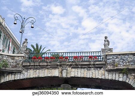 Stock Image - Low angle view of a bridge, Italian Riviera, Via Antonio Gramsci, Santa Margherita Ligure, Genoa, Liguria, Italy. Fotosearch