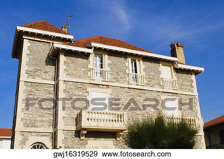 Low angle view of a building, Biarritz, Basque Country, Pyrenees-Atlantiques, Aquitaine, France View Large Photo Image Stock Photo - Low angle view of a building, Biarritz, Basque Country, Pyrenees-Atlantiques, Aquitaine, France. Fotosearch