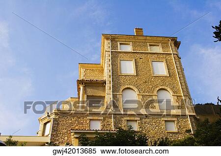 Low angle view of a building, Biarritz, Basque Country, Pyrenees-Atlantiques, Aquitaine, France View Large Photo Image Stock Photography - Low angle view of a building, Biarritz, Basque Country, Pyrenees-Atlantiques, Aquitaine, France. Fotosearch
