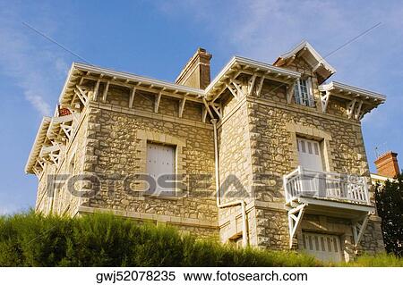 Low angle view of a building, Biarritz, Basque Country, Pyrenees-Atlantiques, Aquitaine, France View Large Photo Image Stock Photography - Low angle view of a building, Biarritz, Basque Country, Pyrenees-Atlantiques, Aquitaine, France. Fotosearch