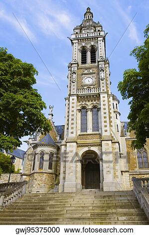 Stock Image - Low angle view of a church, Eglise St. -Benoit, Le Mans, France. Fotosearch