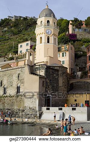 Low angle view of a church in a town, Church of Santa Margherita d'Antiochia, Italian Riviera, Cinque Terre National Park, Vernazza, La Spezia, Liguria, Italy View Large Photo Image Picture - Low angle view of a church in a town, Church of Santa Margherita d'Antiochia, Italian Riviera, Cinque Terre National Park, Vernazza, La Spezia, Liguria, Italy. Fotosearch