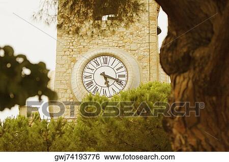 Low angle view of a clock tower, Musee De La Castre, Cote d'Azur, Cannes, Provence-Alpes-Cote D'Azur, France View Large Photo Image Stock Photograph - Low angle view of a clock tower, Musee De La Castre, Cote d'Azur, Cannes, Provence-Alpes-Cote D'Azur, France. Fotosearch