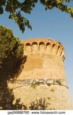 Low angle view of a fort, Rocca di Montestaffoli, San Gimignano, Siena Province, Tuscany, Italy View Large Photo Image Stock Image - Low angle view of a fort, Rocca di Montestaffoli, San Gimignano, Siena Province, Tuscany, Italy. Fotosearch