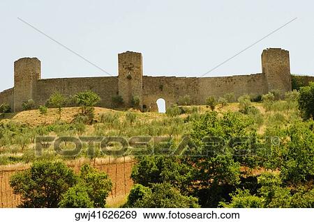 Low angle view of a fort, Monteriggioni, Siena Province, Tuscany, Italy View Large Photo Image Stock Photo - Low angle view of a fort, Monteriggioni, Siena Province, Tuscany, Italy. Fotosearch
