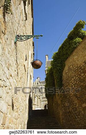 Low angle view of a hanging basket, Le Mans, Sarthe, Pays-de-la-Loire, France View Large Photo Image Stock Image - Low angle view of a hanging basket, Le Mans, Sarthe, Pays-de-la-Loire, France. Fotosearch
