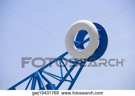 Low angle view of a life belt on a metal frame, Naples, Naples Province, Campania, Italy View Large Photo Image Stock Photo - Low angle view of a life belt on a metal frame, Naples, Naples Province, Campania, Italy. Fotosearch