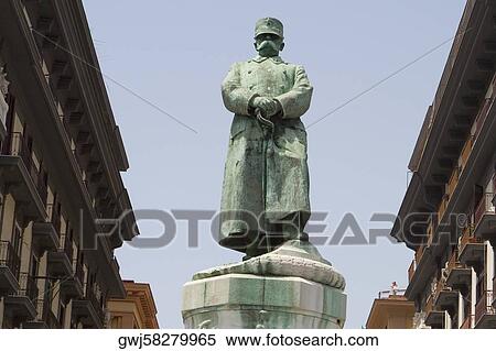 Stock Photography - Low angle view of a statue, Statua di Umberto I, Via Nazario Sauro, Naples, Naples Province, Campania, Italy. Fotosearch