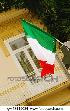 Picture - Low angle view of an Italian flag, Sorrento, Sorrentine Peninsula, Naples Province, Campania, Italy. Fotosearch