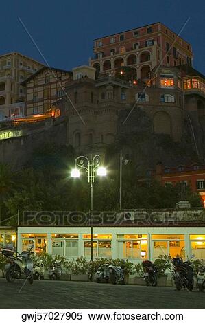 Low angle view of buildings on a hill, Piazza Marinai d’Italia, Sorrento, Sorrentine Peninsula, Naples Province, Campania, Italy View Large Photo Image Stock Photography - Low angle view of buildings on a hill, Piazza Marinai d’Italia, Sorrento, Sorrentine Peninsula, Naples Province, Campania, Italy. Fotosearch