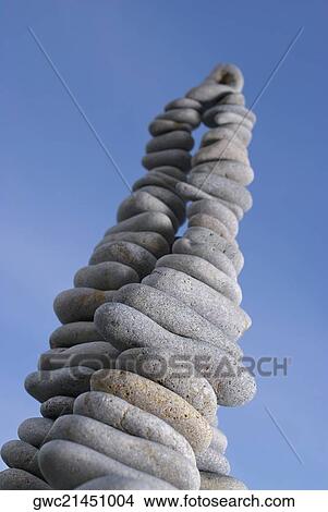 Low angle view of stacks of pebbles View Large Photo Image Picture - Low angle view of stacks of pebbles. Fotosearch
