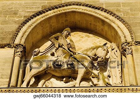 Low angle view of statues carved on the wall of a church, Eglise Sainte-Croix, Bordeaux, France View Large Photo Image Stock Photo - Low angle view of statues carved on the wall of a church, Eglise Sainte-Croix, Bordeaux, France. Fotosearch
