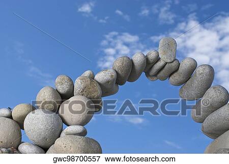 Low angle view of stones arranged in an arch shape View Large Photo Image Stock Photo - Low angle view of stones arranged in an arch shape. Fotosearch