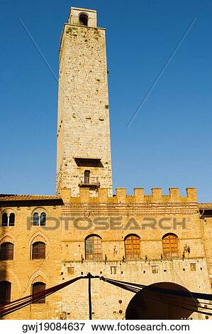 Low angle view of tower of a building, Monteriggioni, Siena Province, Tuscany, Italy View Large Photo Image Stock Photo - Low angle view of tower of a building, Monteriggioni, Siena Province, Tuscany, Italy. Fotosearch