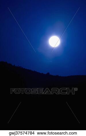 Moon glowing in the sky, Amalfi Coast, Campania, Italy View Large Photo Image Picture - Moon glowing in the sky, Amalfi Coast, Campania, Italy. Fotosearch