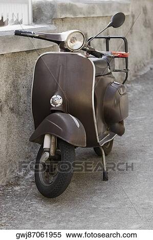 Motor scooter near a wall, Italian Riviera, Santa Margherita Ligure, Genoa, Liguria, Italy View Large Photo Image Stock Photography - Motor scooter near a wall, Italian Riviera, Santa Margherita Ligure, Genoa, Liguria, Italy. Fotosearch