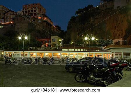 Parking lot in front of a building, Piazza Marinai d’Italia, Sorrento, Sorrentine Peninsula, Naples Province, Campania, Italy View Large Photo Image Stock Image - Parking lot in front of a building, Piazza Marinai d’Italia, Sorrento, Sorrentine Peninsula, Naples Province, Campania, Italy. Fotosearch