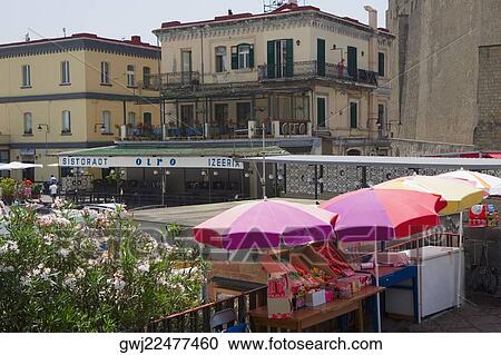 Patio umbrellas in a market, Borgo Marinaro, Bay of Naples, Naples, Naples Province, Campania, Italy View Large Photo Image Stock Image - Patio umbrellas in a market, Borgo Marinaro, Bay of Naples, Naples, Naples Province, Campania, Italy. Fotosearch
