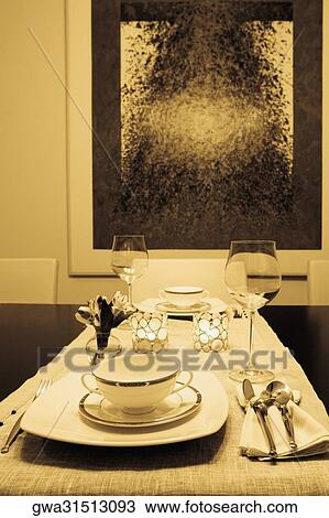 Stock Image - Place setting on a dining table. Fotosearch