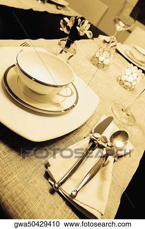 Stock Image - Place setting on a dining table. Fotosearch