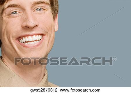 Stock Image - Portrait of a businessman smiling. Fotosearch