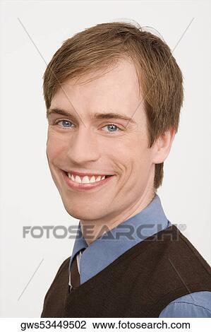 Portrait of a businessman smiling View Large Photo Image Stock Image - Portrait of a businessman smiling. Fotosearch