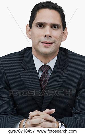 Portrait of a businessman smirking View Large Photo Image Stock Photo - Portrait of a businessman smirking. Fotosearch