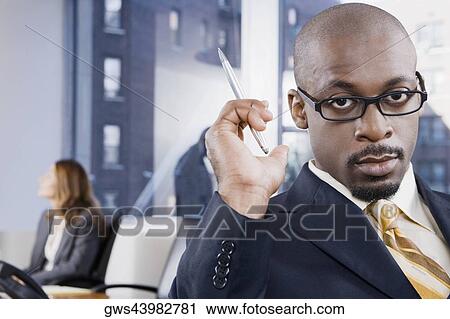 Portrait of a businessman thinking View Large Photo Image Stock Image - Portrait of a businessman thinking. Fotosearch