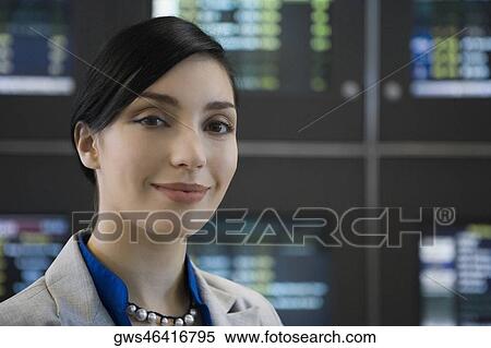 Stock Photography - Portrait of a businesswoman smiling. Fotosearch