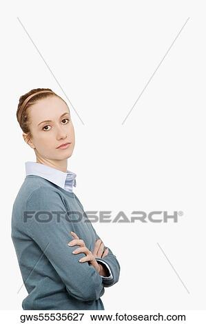 Portrait of a businesswoman standing with her arms crossed View Large Photo Image Stock Photo - Portrait of a businesswoman standing with her arms crossed. Fotosearch