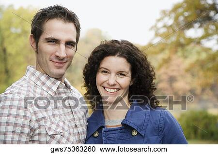 Stock Image - Portrait of a couple standing together. Fotosearch