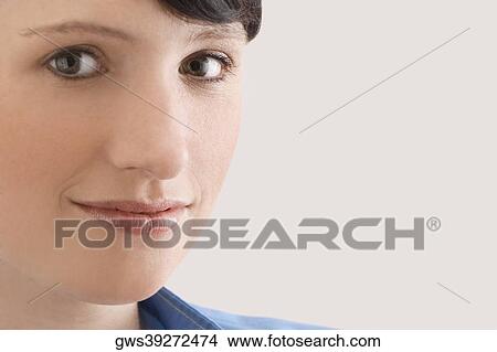 Picture - Portrait of a female doctor smiling. Fotosearch