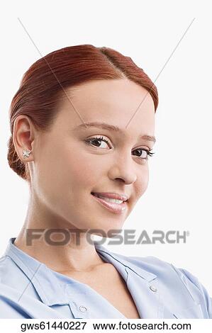 Stock Photo - Portrait of a female doctor smiling. Fotosearch
