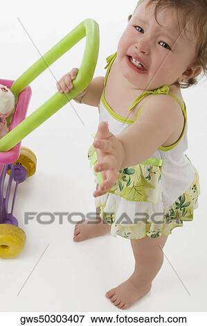 Stock Photo - Portrait of a girl crying. Fotosearch